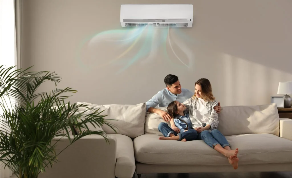 Family enjoying cool air from a split system air conditioner